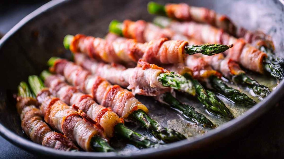 Asparagus is delicious on its own, but when you add bacon, it's irresistible!
