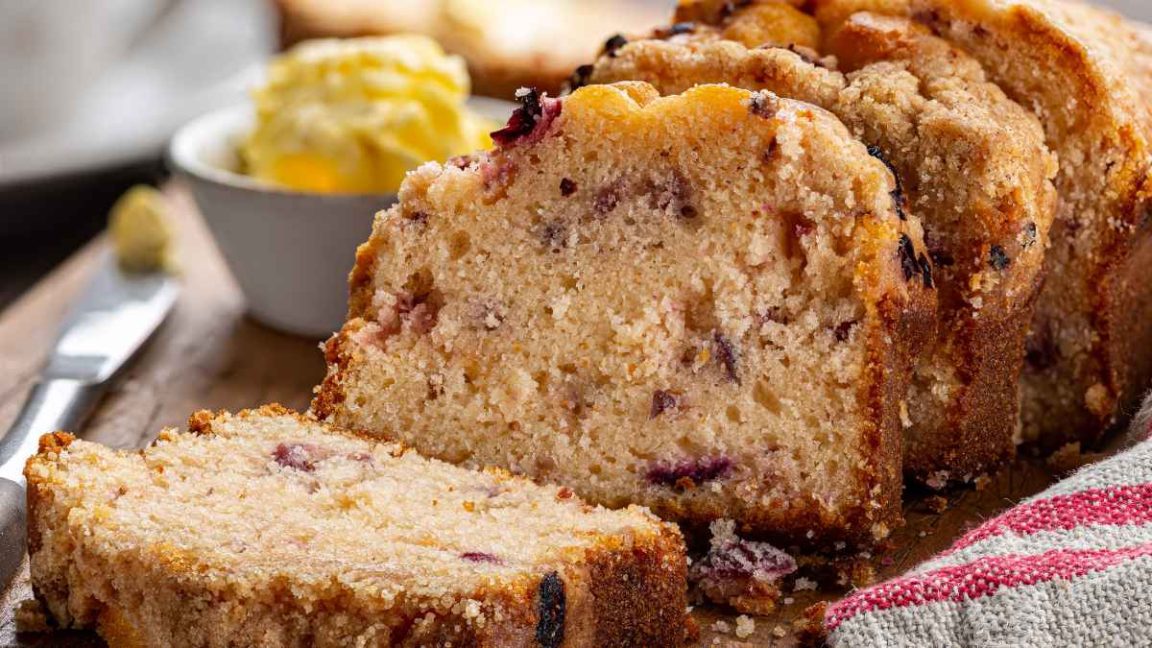 Bright citrus, tangy cranberries, and a tender crumb—baking perfection in every slice!